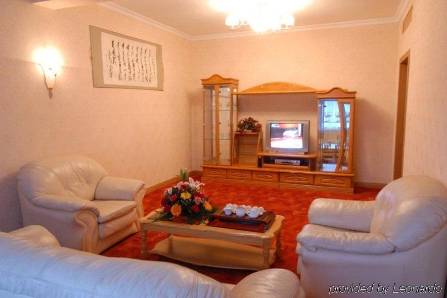 New Century Hotel Яншо Номер фото